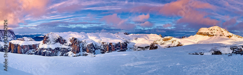 Beautiful panoramic view to the Sellaronda - the largest ski carousel in Europe - skiing the four most famous passes in the Dolomites (Italy), extraordinary snowy peaks of the dolomites, southern alps photo