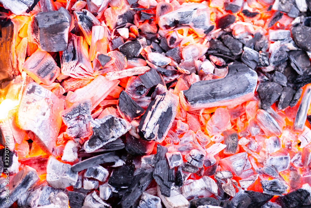 The burning charcoal. Hot fire close-up. Preparation of coal before cooking.