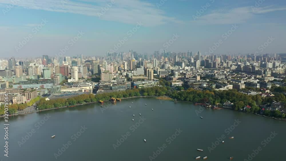 sunny day flight over hangzhou cityscape famous lake traffic coastline aerial panorama 4k china sunny day flight over hangzhou cityscape famous lake traffic coastline aerial panorama 4k china