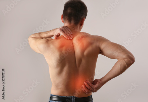Принти на полотні Man suffering from back and neck pain