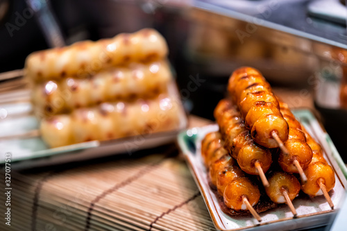 Εκτύπωση καμβά Display of hot mochi dango snack with rice cake and miso soy sauce syrup on bamb