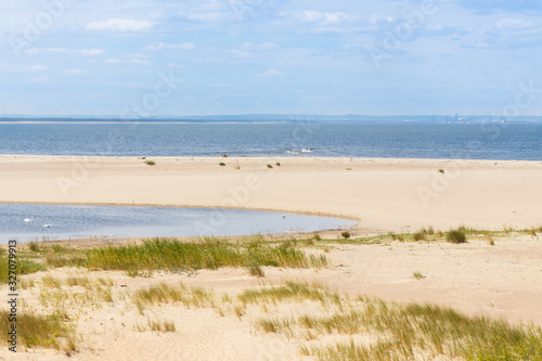 Sandy beach by the calm sea