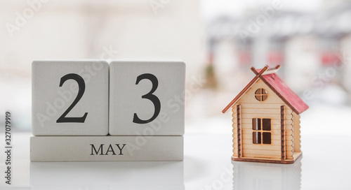 May calendar and toy home. Day 23 of month. Card message for print or remember