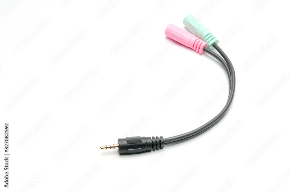 Audio video adapter cable with trrs jack to trs connectors on a white background Audio video adapter cable with trrs jack to trs connectors on a white background