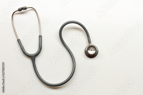 Stethoscope on a white background with space for text.