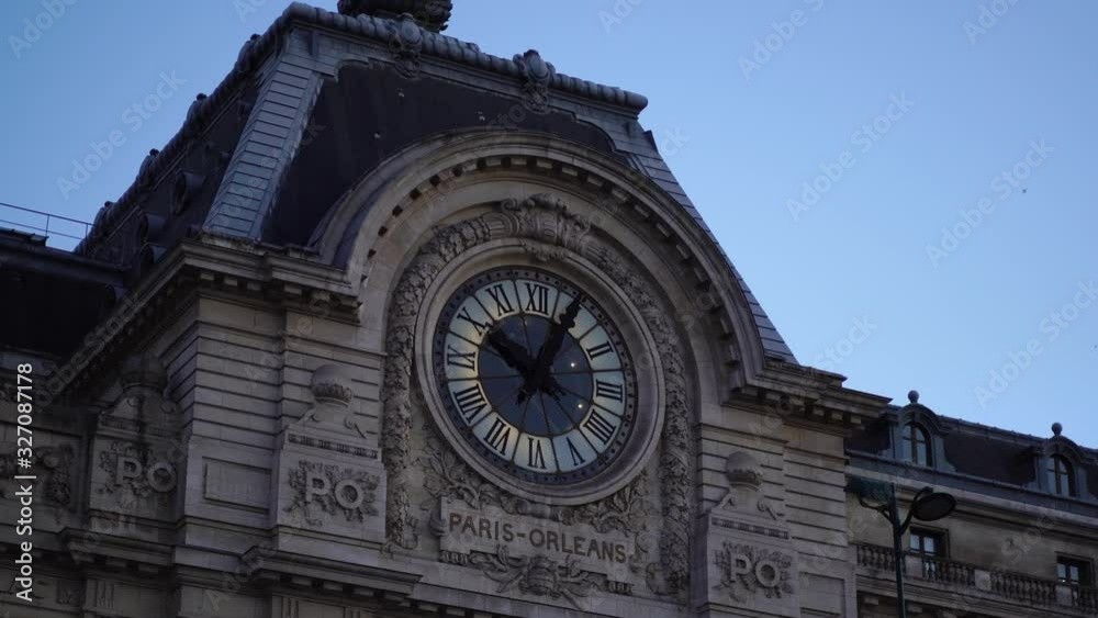 Historic clock on building facade. Musée d'Orsay. Glide shot. Paris tourism attraction & famous landmark. Romantic honeymoon travel destination. Historic clock on building facade. Musée d'Orsay. Glide shot. Paris tourism attraction & famous landmark. Romantic honeymoon travel destination.