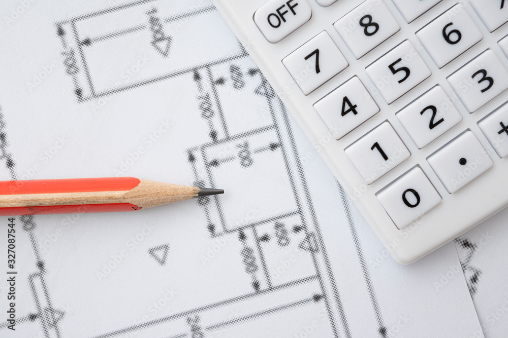 Architectural drawing, calculator and pencil Architectural drawing, calculator and pencil