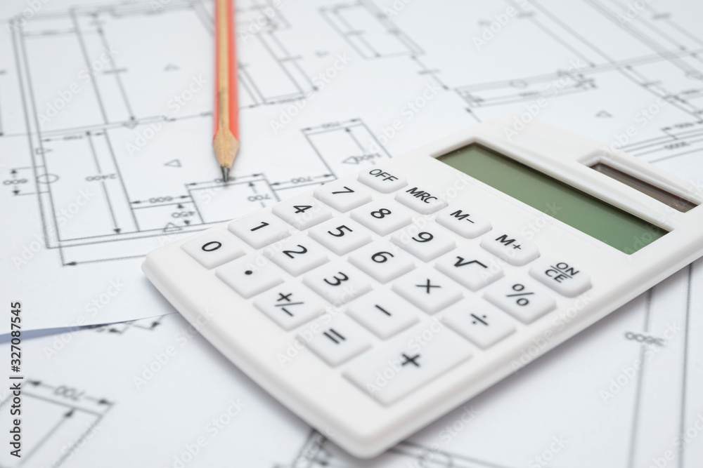 Architectural drawing, calculator and pencil Architectural drawing, calculator and pencil