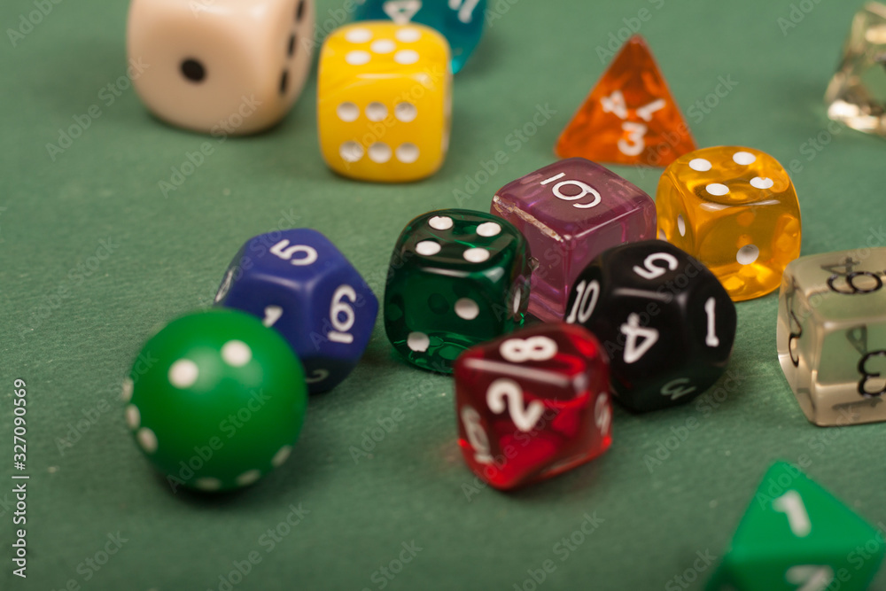 game of dices on a green background game of dices on a green background