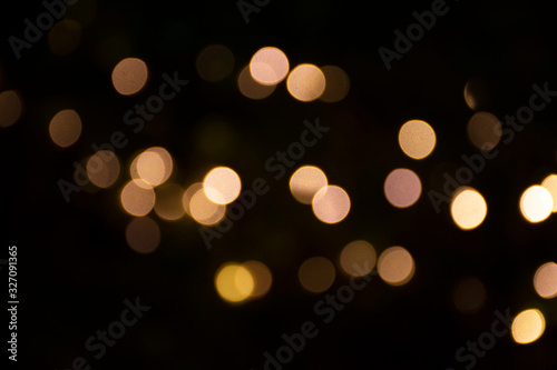 Motion movement of colorful Bokeh of led lingthing in garden of street market fair at Nakhon Ratchasima, Thailand.