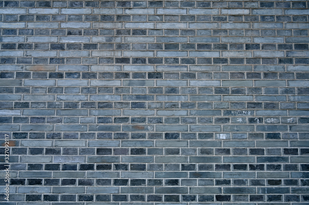 Gray brick wall texture background of Chinese garden architecture Gray brick wall texture background of Chinese garden architecture