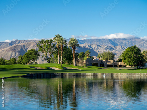 View of water features on a golf course in Palm Desert, CA.Palm Desert and Palm Springs are popular golf destinations. 