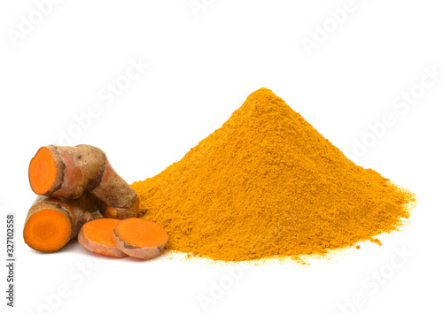 Turmeric root (Curcumin) and powder on a white background,isolate.