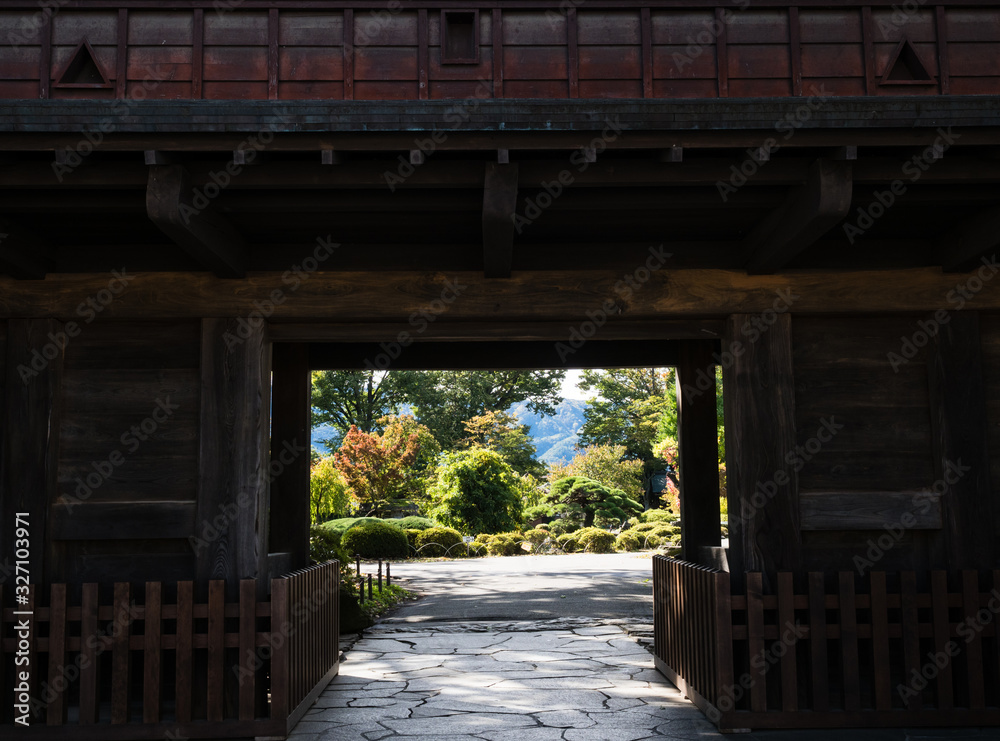 Wooden gate of historic Takashima castle in Suwa - Nagano prefecture, Japan Wooden gate of historic Takashima castle in Suwa - Nagano prefecture, Japan