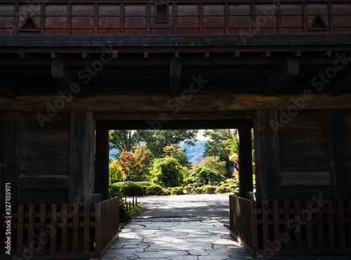 Fototapeta Naklejka Na Ścianę i Meble -  Wooden gate of historic Takashima castle in Suwa - Nagano prefecture, Japan