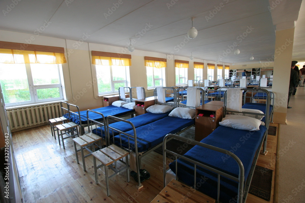 Bedroom department in the military barracks. Barracks for soldiers