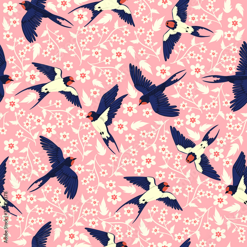 Seamless pattern with swallows and flowers. Vector graphics.