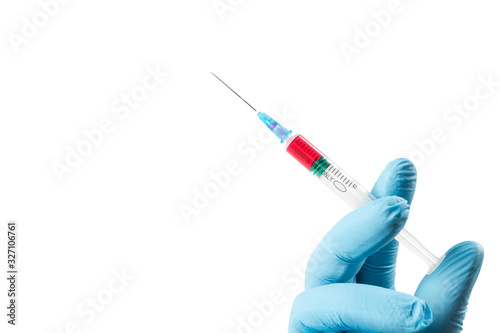 Medicine plastic vaccination equipment with needle in doctor or nurse hand isolated on white background. Health care concept. Hand holding syringe and vaccine. Injection syringe isolated.