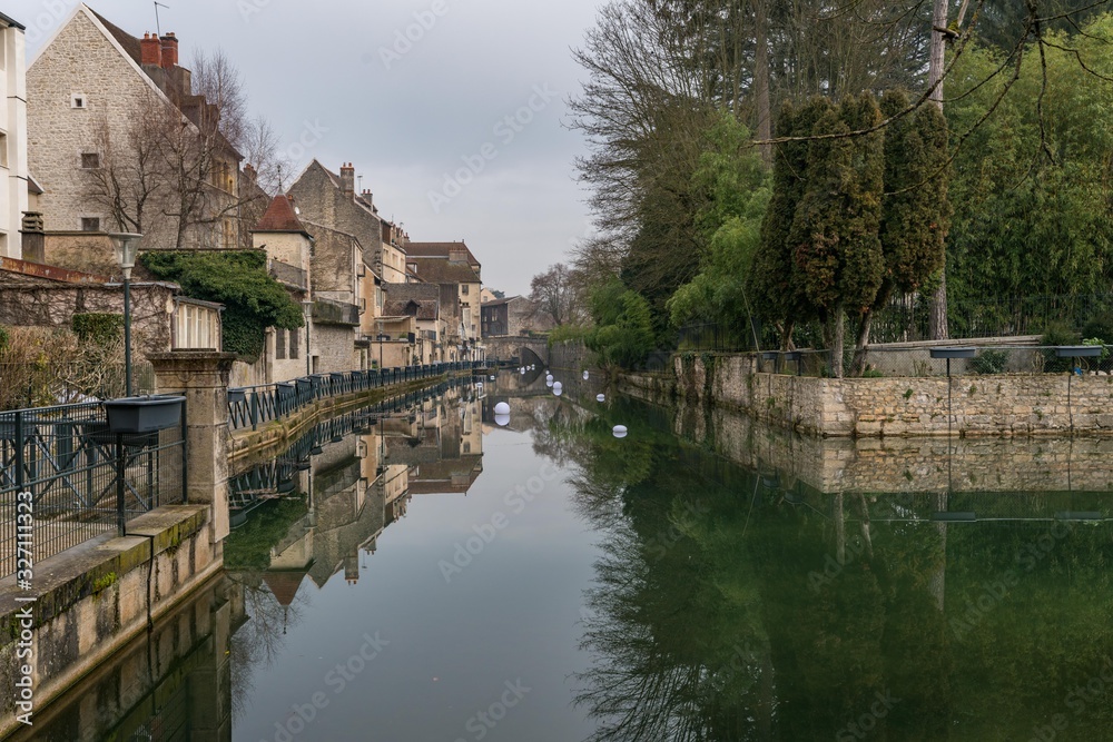 Ancient French classic medieval town with river in front, Dole, Burgundy, France
