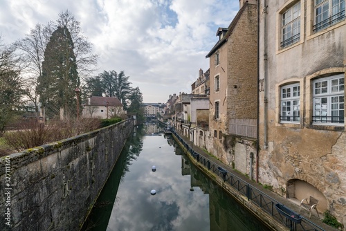 Ancient French classic medieval town with river in front, Dole, Burgundy, France