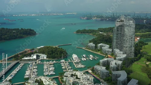 singapore city sunny day apartment bay complex yacht dock marina traffic road aerial panorama 4k  photo