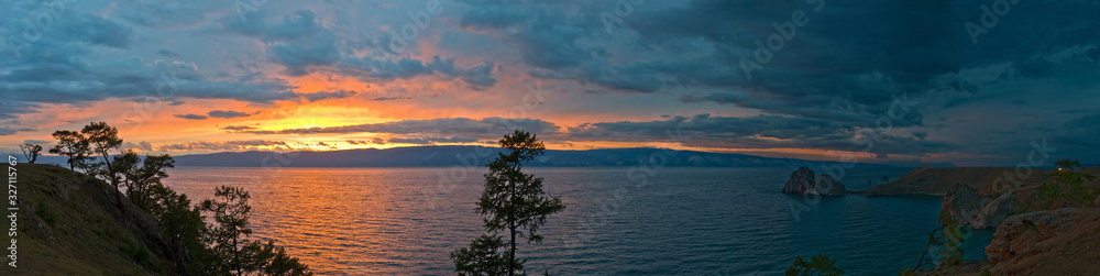 Panoramic views of the sunset over the lake Baikal.