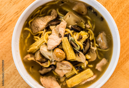 Yellow noodles  in  bowl , Thai or Chinese food