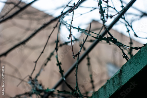 barbed wire on a concrete fence, Moscow
