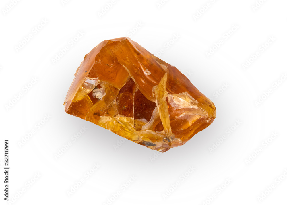 Piece of natural raw amber with white inclusions isolated on white background Piece of natural raw amber with white inclusions isolated on white background