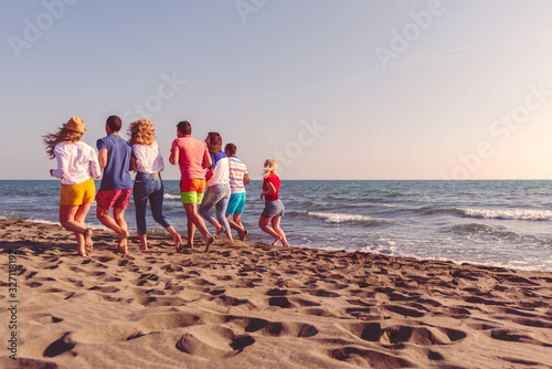 Enjoying a walk on the beach with friends