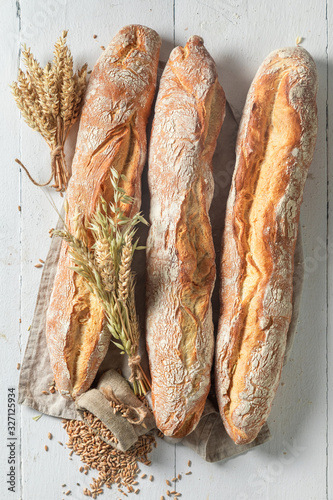 Crunchy french baguettes freshly baked in bakery photo
