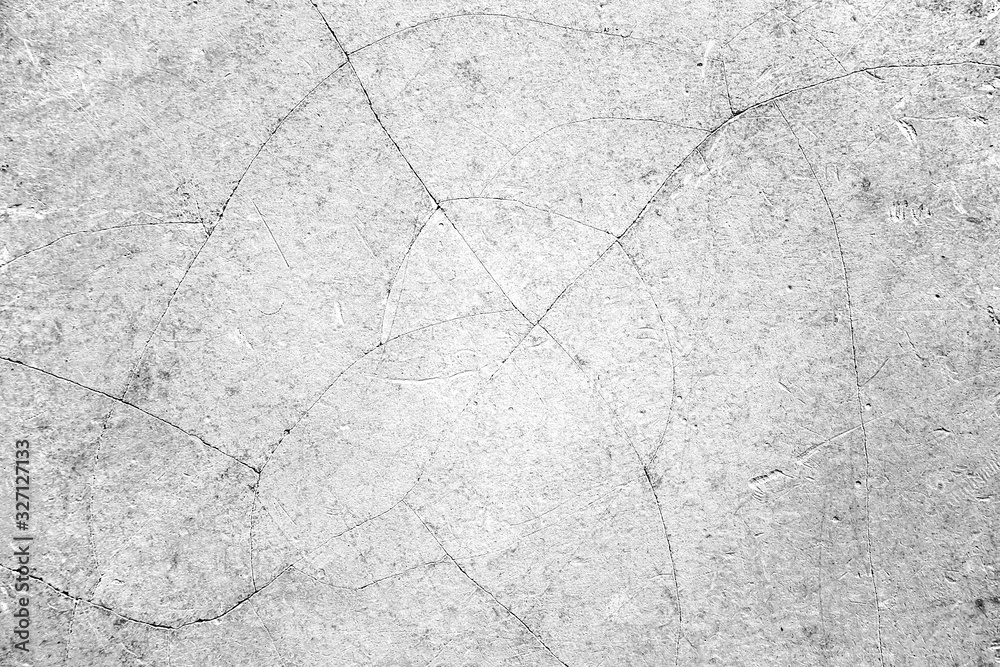 Obraz premium Raw old cement or concrete or plaster wall with stains and cracks for background and texture.