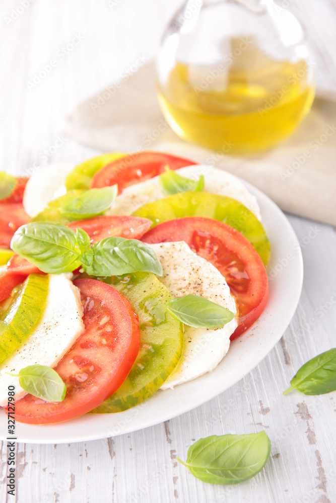 tomato salad with mozzarella, basil and olive oil