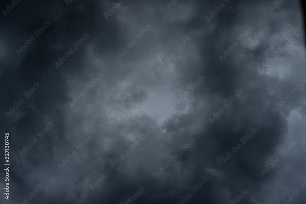 Dark black clouds in the sky, Stormy rain clouds background. Dark black clouds in the sky, Stormy rain clouds background.
