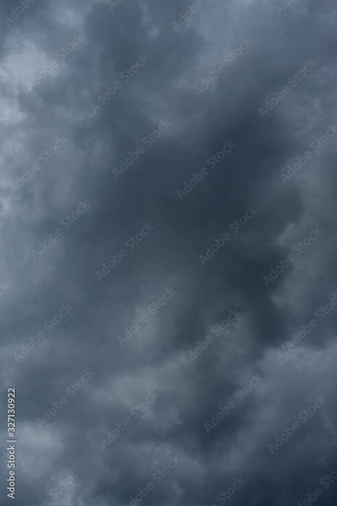 Dark black clouds in the sky, Stormy rain clouds background.