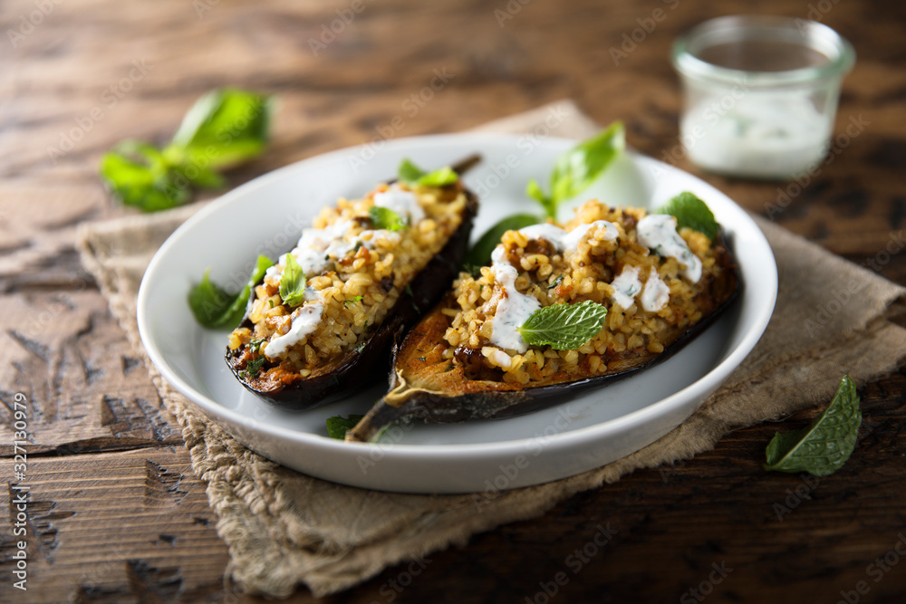 Roasted spicy eggplant with bulgur and yogurt