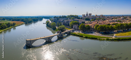 Famous old stone bridge and Rhone river in Avignon, France