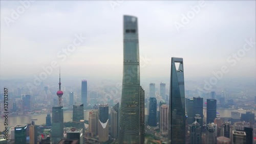 evening time shanghai cityscape pudong downtown megatalls aerial panorama 4k tilt shift china photo