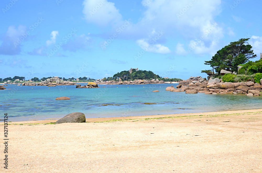 View at the Island Costaérès with its castle, Pink Granite Coast or Cote de Granite Rose in Brittany, France