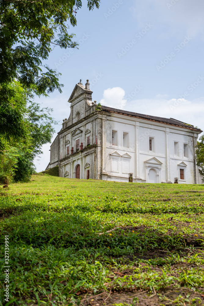 Roman Catholic chapel/church on the mount. Church landscape with natural stairs leading to a church on the hill. 