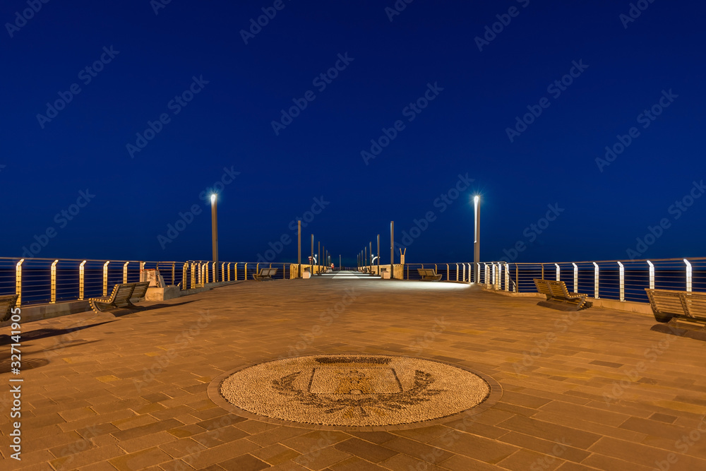 Obraz premium Night view of the quayside of Alassio, Italian Riviera