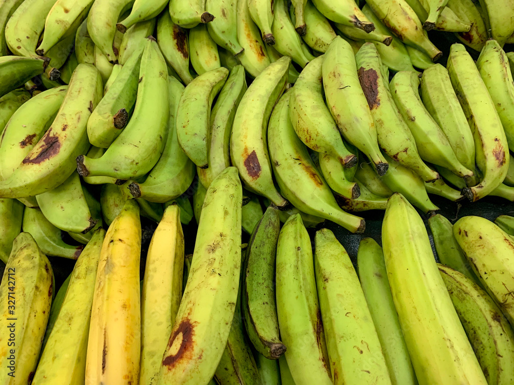 Pile of green plantains on sale at a market, Panama, Central America