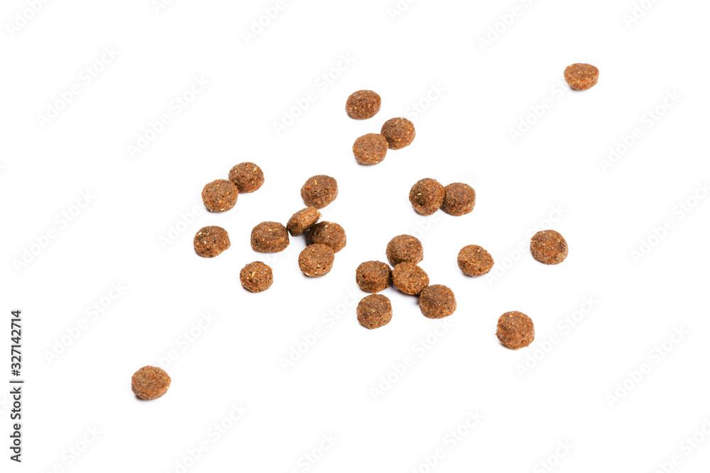 Naklejka premium Dry cat food isolated on white background close-up top view