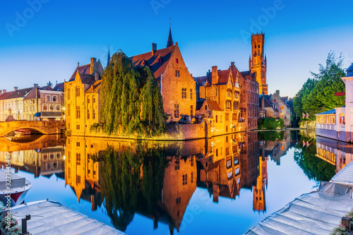 Bruges, Belgium. The Rozenhoedkaai canal and the Belfry.