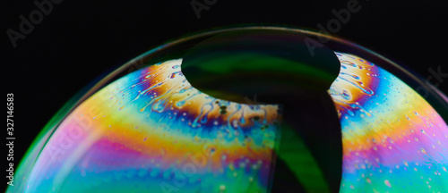 Colorful reflection on soap bubble