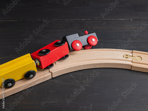 Wooden toy train with dark background