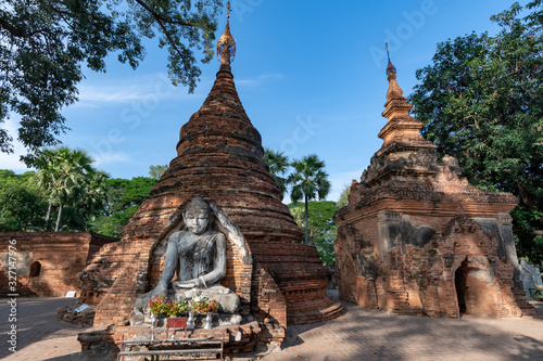 Buddha statue and temple stupas
