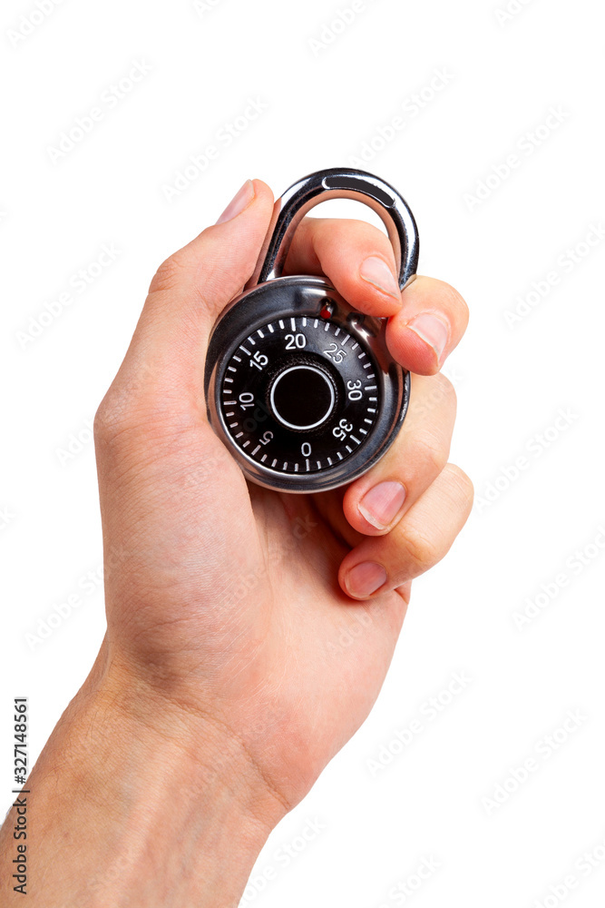 Human hand holding up a round closed locked coded padlock, closeup. Security, data safety, protection, privacy small simple metal number password circular code lock in firm grasp isolated on white