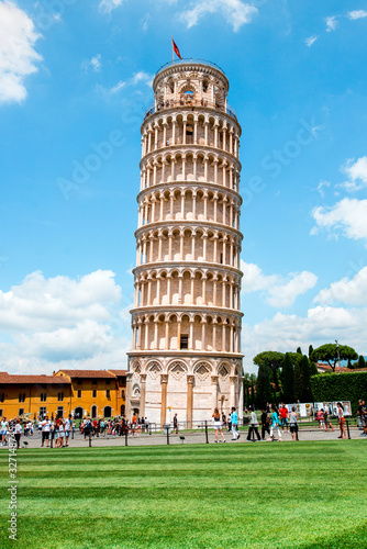 Obraz na płótnie Picturesque landscape with church and famous sloping tower in Pisa, Italy. fascinating exotic amazing places. w salonie