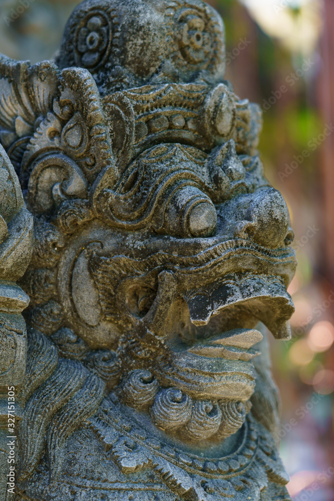 Ancient Balinese statue at the temple